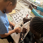 kids playing tangram in rescue centre