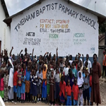 group photo at school entrance